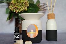 Load image into Gallery viewer, Ceramic wax melter and oil warmers and reed diffuser bottles.