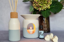 Load image into Gallery viewer, Ceramic wax melter and oil warmers and reed diffuser bottles.