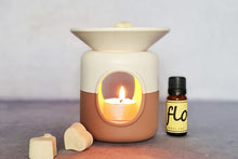 Load image into Gallery viewer, Ceramic wax melter and oil warmers and reed diffuser bottles.